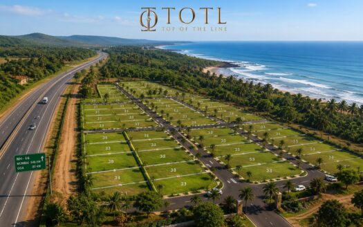 Luxury coastal land plotting development near a highway in the emerging Maha-Goa region, surrounded by greenery, palm trees, and sustainable villa communities, representing climate-friendly living and land investment in Goa.